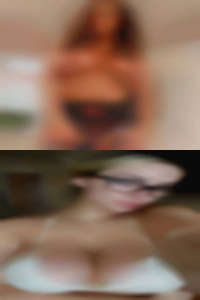 Big nude woman boobs hang out.